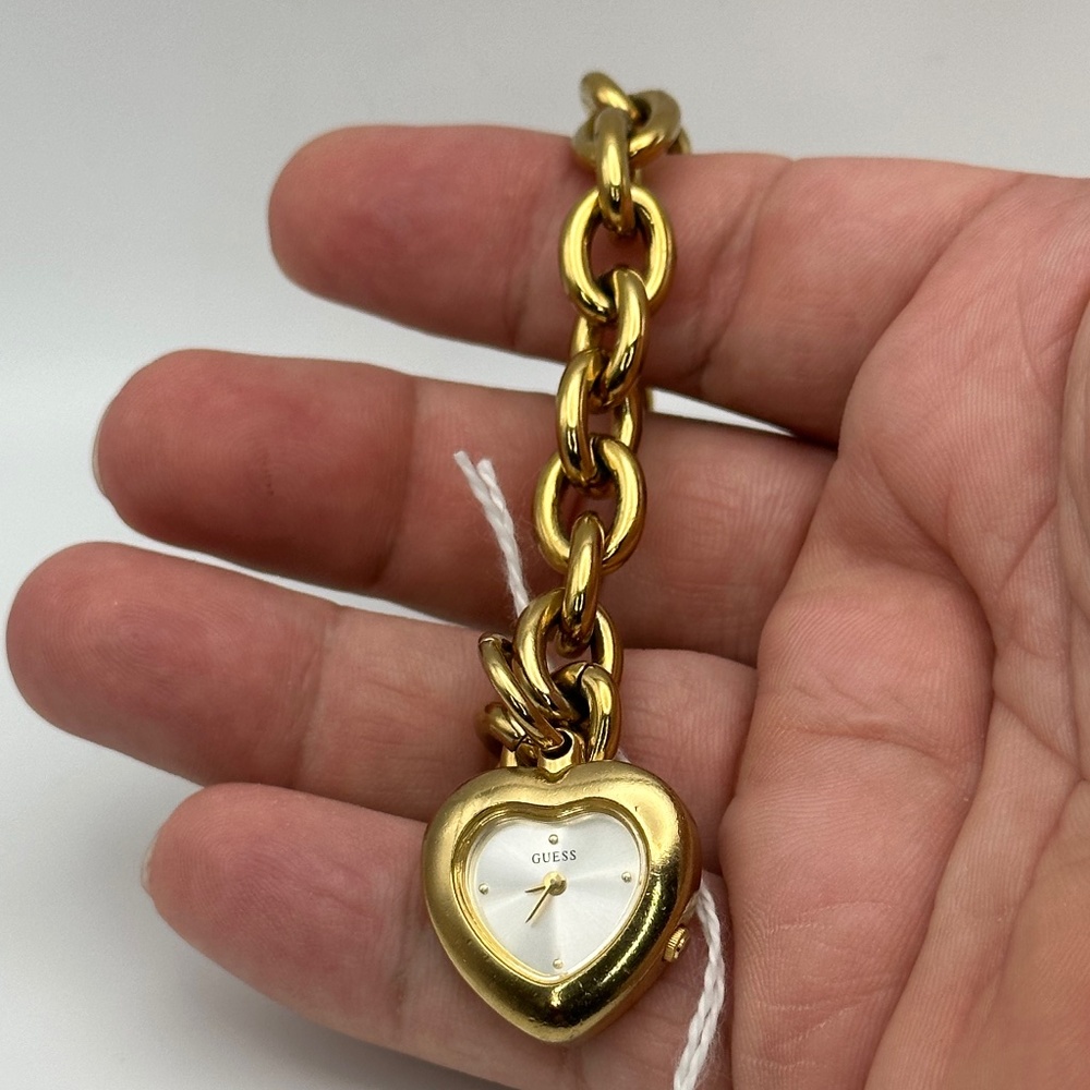 Guess gold tone charm bracelet with heart watch charm G55227L